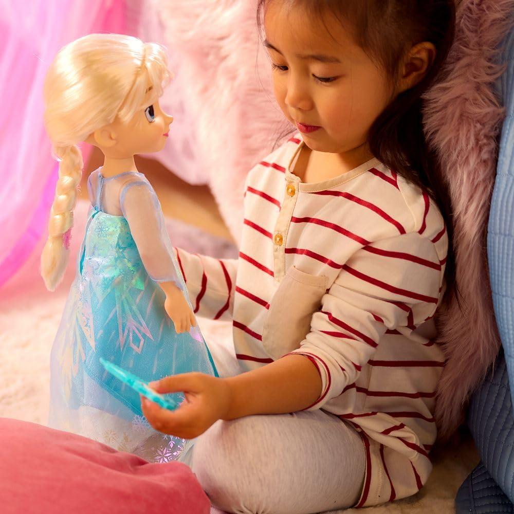 imageDISNEY STORE Official Anna Once Upon a Story Doll  16 Inch Disney Princess Toys Featuring Reflective Eyes with 3D Pupil and Iris Detailed Costume Hair Comb ampamp Shoes  Comes in Display BoxElsa