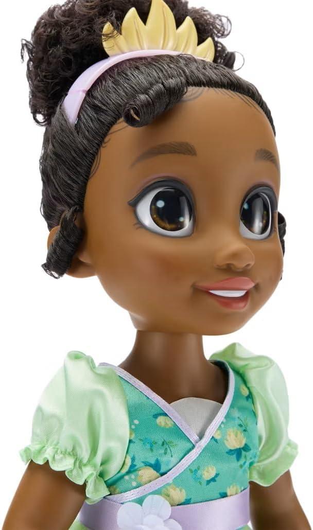 imageDISNEY STORE Official Anna Once Upon a Story Doll  16 Inch Disney Princess Toys Featuring Reflective Eyes with 3D Pupil and Iris Detailed Costume Hair Comb ampamp Shoes  Comes in Display BoxTiana