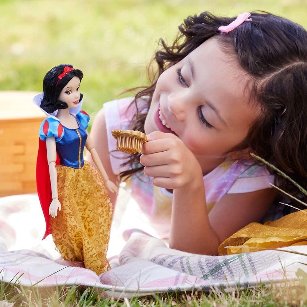 imageDisney Store Girls Princess Classic Doll Merida 11 Inches Includes Brush with Molded Details Fully Posable Toy in Classic OutfitSnow White